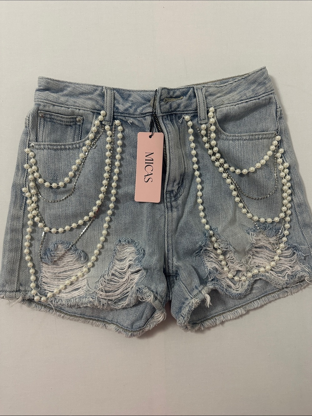 Micas Light Blue Distressed Denim Shorts with Pearl Chain Embellishments